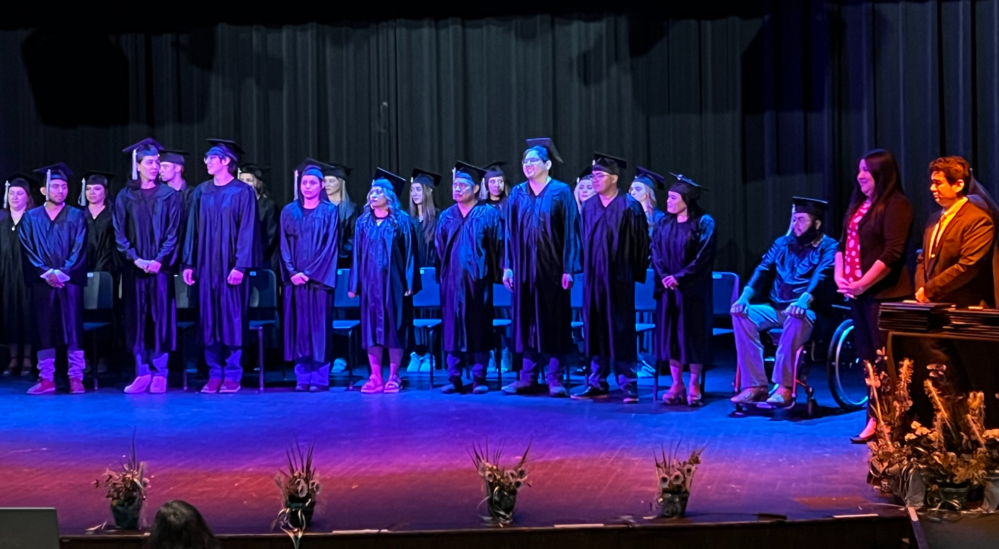 Kansas High School Diploma graduates walk the stage at Jesus A